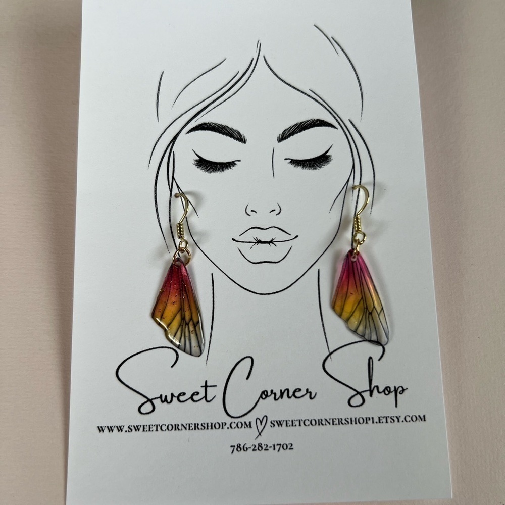 Pink and yellow earrings for women.